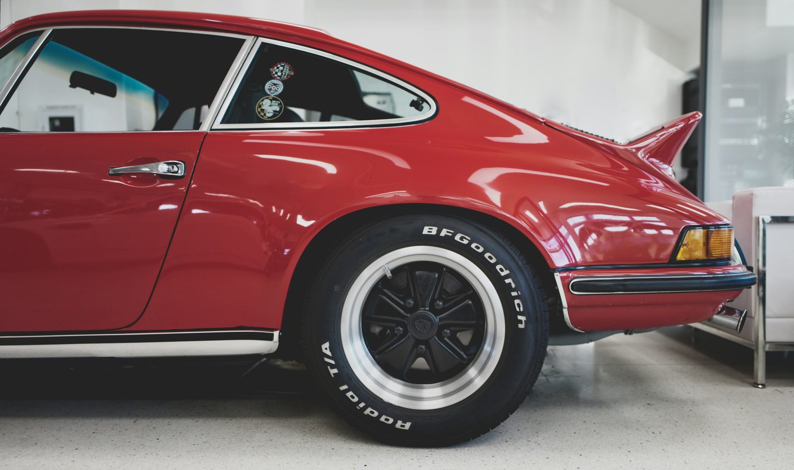parked red coupe
